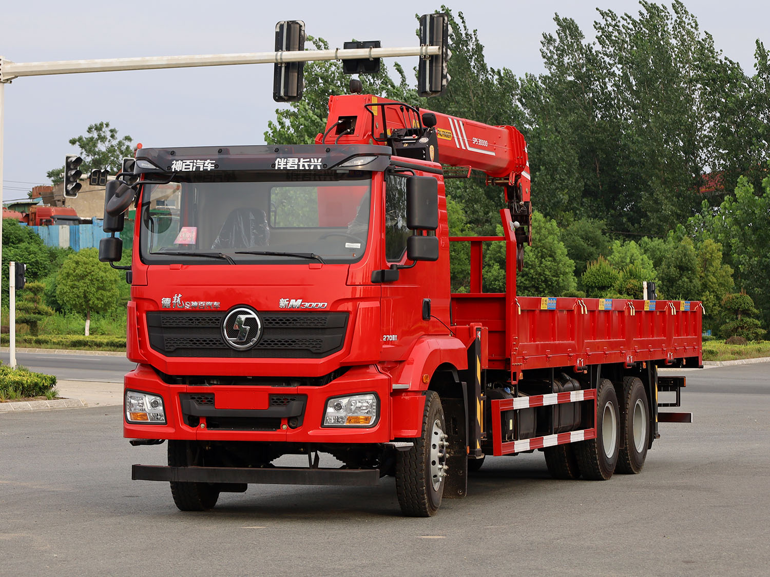 陜汽德龍新M3000后雙橋上裝三一12噸直臂式吊機